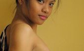 LBFM 108665 Teenage cutie stripping and spreading to show her tight hairless brown pussy
