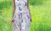 LBFM 108735 Noon doesn't wear any panties and she lifts her dress outdoors to show her assets
