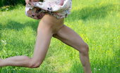LBFM 108735 Noon doesn't wear any panties and she lifts her dress outdoors to show her assets
