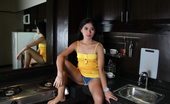 LBFM 109031 Attractive Vilma strips and flashes her brown love orifices in her kitchen
