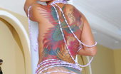 LBFM 109205 Cute Jandi Lin is only dressed with colorful tattoos and pearls
