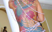 LBFM 109205 Cute Jandi Lin is only dressed with colorful tattoos and pearls
