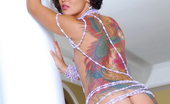 LBFM 109205 Cute Jandi Lin is only dressed with colorful tattoos and pearls
