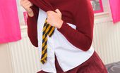 Only Tease Daisy Watts 109555 Daisy Watts slowly removes her college uniform.
