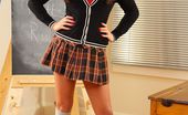 Only Tease Daisy Watts 109629 Daisy strips from schoolgirl outfit in black lingerie

