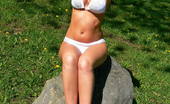 Tiffany Preston Posing in sexy white bikini outdoor 110737 I use to go to the park near home for a walk and a little relax time, but this time I feel like walking wearing my new white bikini, and I found a nice place to take some sexy pictures, I want to share them with you, I hope you like them :)
