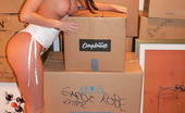 Tiffany Preston Getting horny while I'm moving 110768 I was filling boxes with my stuff before moving to my new house, and suddenly I started feeling a little horny. Thanks God I had my toys box within reach of my hand, so I started stripping and masturbating my pussy with a big black rubber dick until reach