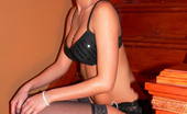 Tiffany Preston Tiffany posing in black lingerie 110801 Hey guys there is a great photoset of me in sexy black lingerie and stocking posing in stairs and taking of my panty to show you my little wet pussy and round butt.
