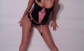Tiffany Preston Tiffany in a black satin corset 110831 This is a nice photo set guys, in this one I’m wearing a nice tight and black satin corset then taking it off to finger my pink pussy and tight butt hole!
