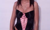 Tiffany Preston Tiffany in a black satin corset 110831 This is a nice photo set guys, in this one I’m wearing a nice tight and black satin corset then taking it off to finger my pink pussy and tight butt hole!
