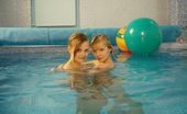 Club Seventeen Esther And Hilary 114024 Two horny lesbian teenagers swimming together in a pool
