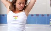 Club Seventeen Mary 115265 A horny girl washing her cute teenage titties in the tub