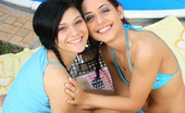 Club Seventeen Cindy And Nomi 115382 Horny bikini lesbians caressing cooters near a big pool

