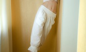 Club Seventeen Paige 115490 A horny skinny teenage chick undresses her perfect body
