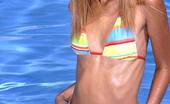 Club Seventeen Exotic petite teen with perfect body poses for cam in pool
