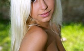 Club Seventeen Evelyn aka Lola 117307 Blonde teen sweetie showing her fine and curvy body outdoor
