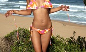 Club Seventeen Niya 117457 Cute ebony teenager showing her curvy black body on a beach
