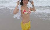 Christine Young 121785 Cute young hottie Christine Young teasing on a nice beach
