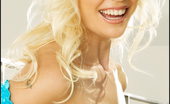 Blonde Babe in Fishnet Foxes.com Mariya Spirieva 122544 Blonde in Blue Fishnet Top
