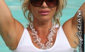 Rachel Aziani  123248 Shows Off Her White Retro Swimsuit As She Gets Wet In The Pool
