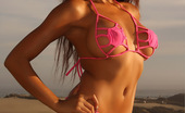 Alluring Vixens Jeri 123682 Vixen Jeris Huge Tits Are Barely Covered By Her String Bikini Top
