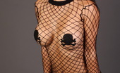Alluring Vixens Kira 123719 Kiras Huge Tits Are Just Covered By Skull Pasties And A Fishnet Top
