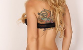 Alluring Vixens Mindy Robinson 123970 Blonde Vixen Mindy Robinson Shows Off In A Semi-Sheer Tube Top And Tiny Black Lace Panties
