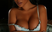 Alluring Vixens Melanie Elyza 124027 Vixen Melanie Elyzas Big Juicy Tits Are Busting Out Of Her Baby Blue Ruffled Bra Top
