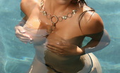 Alluring Vixens Claudia 124069 Perfect Vixen Babe Claudia Teases In The Pool In A Tight White Top That Quickly Comes Off
