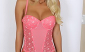 Alluring Vixens Bonus Vixens 124116 Busty Blonde Vixen Alysson Teases In A Tight Lowcut Pink Corset That Barely Contains Her Big Tits
