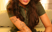 Aziani 139434 Mya Manages To Look Super Sexy Wearing Studded Leather Bands And Military Green Dress.
