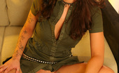 Aziani 139434 Mya Manages To Look Super Sexy Wearing Studded Leather Bands And Military Green Dress.
