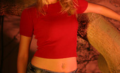 Aziani 139447 Blonde Babe Tricia Wears A Jeans Skirt And Tight Red Top. She Doesn'T Wear Panties And Reveals Her Shaved Pussy Under Her Skirt
