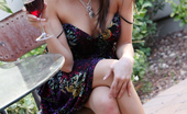 Andi Land SippingWineOutside
