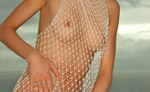 Ron Harris Guinevere 162617 Hot Guinevere Seductive In Her Fishnet Dress Playing Her Pussy With Her Fingers
