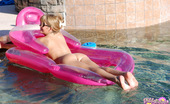Diddylicious 170838 Diddy Shows Off Her Tight Little Ass While Floating In The Pool On A Raft
