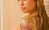 Juicy Pink Box Miss Phoenix 174273 Miss Phoenix, A Tattooed And Pierced Beauty, Takes To The Shower To Soap Up Her Big, Luscious Tits And Tight, Shapely Ass!
