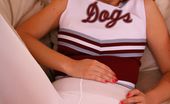 Only Opaques Amy P 174311 Amy P Looks Perfect Posing In Her Cheerleader Uniform On Her Sofa.
