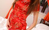 Only Opaques Sophia Smith 174314 Fabulous Redhead Looking Stunning In Oriental Dress And Black Stockings.
