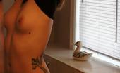 Revenge TV 177327 Inked Cutie Stripping In Front Of The Mirror
