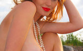 Erotic Beauty Maria D Ron Offlin Spring 2 189186 Maria D Looks Stunning Walking On The Rocky Shore In Her Sexy Red Fishnet Coverup. Feast Your Eyes Upon Her Luscious Full Breasts Adorned With White Pearls.
