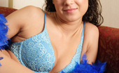 Spunky Angels Erin 189418 Erin In A Blue Lace Bra And A Blue Boa Erinlotsofcolornn
