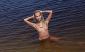 Errotica Archives Lympha Afina 196641 Afina Flaunts Her Petite Yet Magnificently Toned Body With Tight And Firm Assets As She Sprawls On The Sandy Shore Of The Lake. Flora
