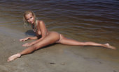 Errotica Archives Lympha Afina 196641 Afina Flaunts Her Petite Yet Magnificently Toned Body With Tight And Firm Assets As She Sprawls On The Sandy Shore Of The Lake. Flora
