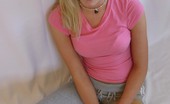 Skye Model 197373 Super Cute Skye Poses For Pictures In A Tight Pink Shirt And Grey Sweat Capris
