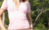 Skye Model 197406 Petite Blonde Babe Skye Shows Off Her Perky Body As She Strips Outdoors Down To Little Pink G-String
