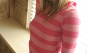 Skye Model 197437 Petite Teen Babe Skye Teases With Her Perky Tits As She Lifts Her Pink Striped Shirt
