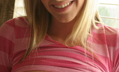 Skye Model 197441 Teasing Blonde Teen Skye Shows Off Her Perky Tits As She Strips Out Of Her Pink Striped Shirt
