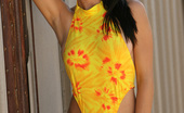 Nextdoor Models Cassie 202611 Cassie Channels The Sun Gods In Her Hot Yellow And Orange One Piece
