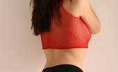 Nextdoor Models Casandra 202712 Casandra Must Not Like Her Red Fishnet Tank Top, Because She Has To Takes It All Off
